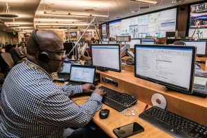 Operations control room with complex operational systems, illustrating the infrastructure challenges of scaling AI in enterprise environments