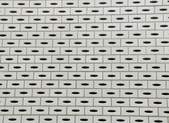 Structured grid of repeating architectural panels illustrating the layered, systematic design of an enterprise AI framework