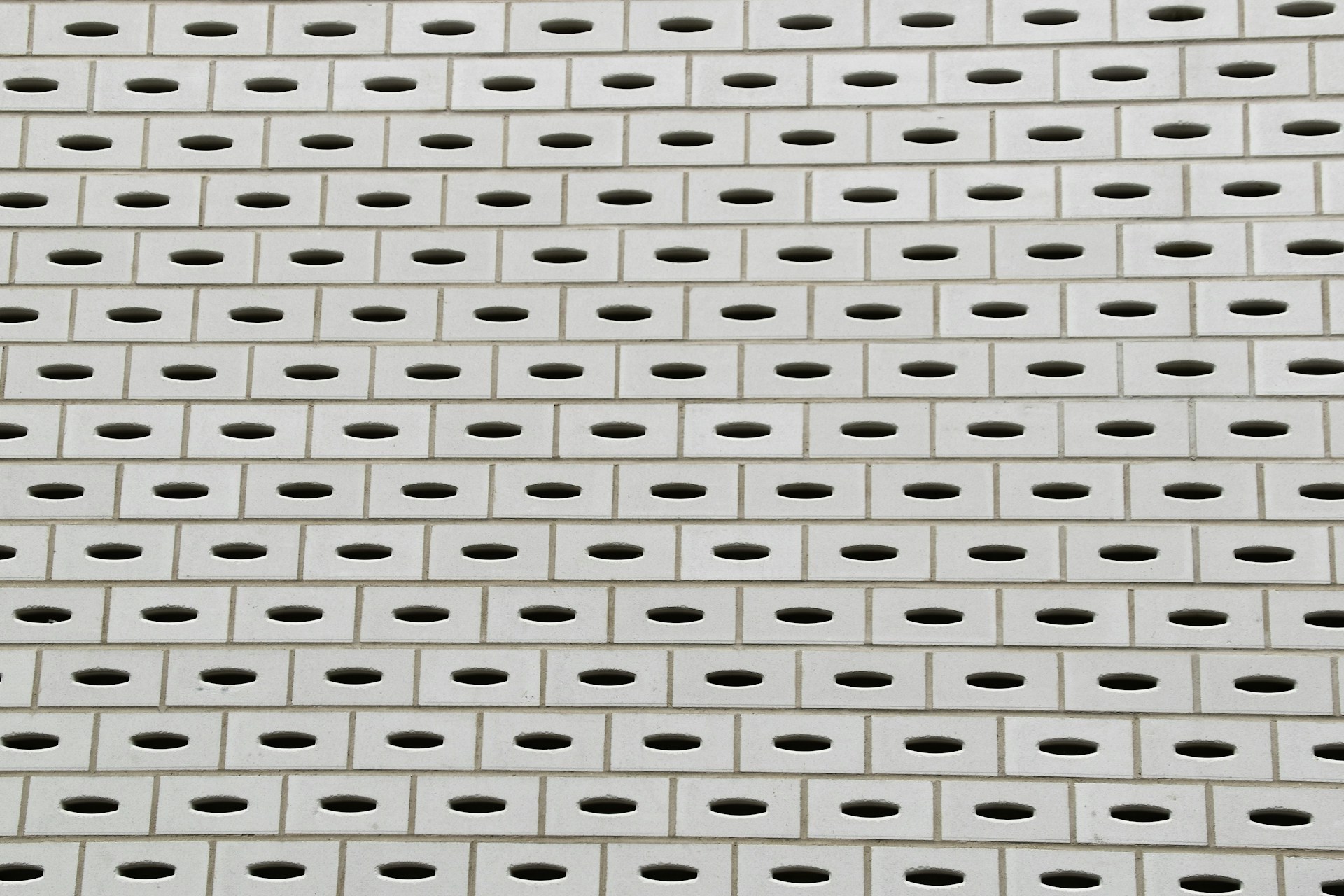 Structured grid of repeating architectural panels illustrating the layered, systematic design of an enterprise AI framework